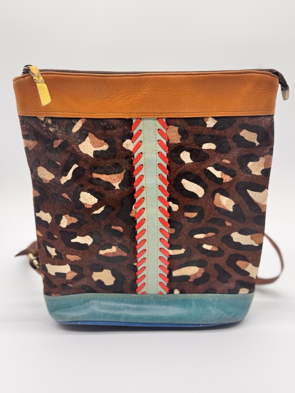 Leopard Print Leather Backpack with Tan Trim and Teal Base Soruka brand